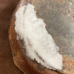 salt and vinegar on a cast iron skillet