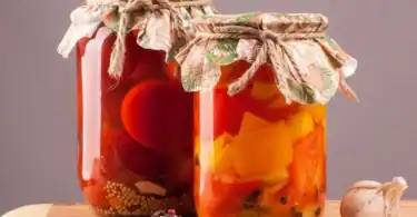 pickled food in jars with decorative lids