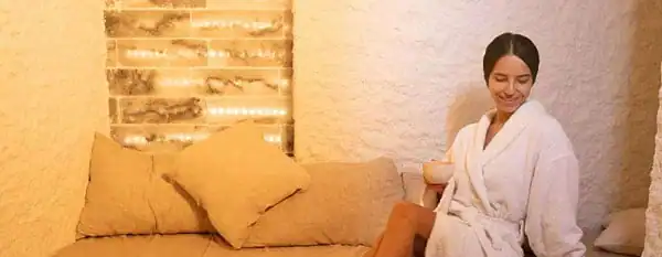 halotherapy salt room woman in robe