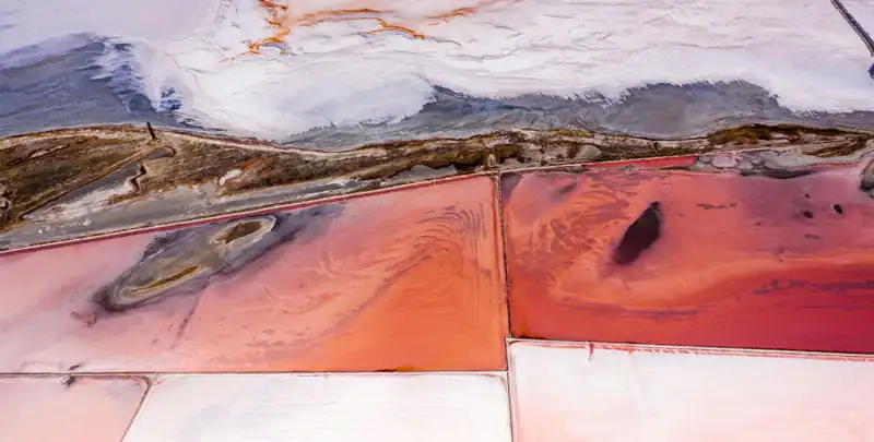pink salt from evaporative salt pans near ocean