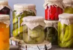 variety of pickled food in jars for food preservation